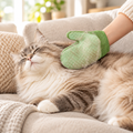 Cat grooming glove in use on a cat